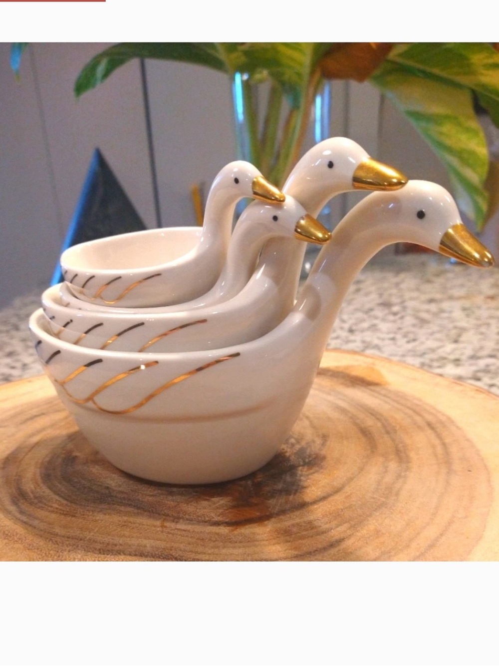 ANTHROPOLOGIE Guilded Ceramic Nesting Geese Measuring Cups
4 Piece Set